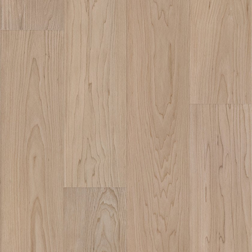 COREtec CR506 luxury vinyl plank Vanilla Grove Maple Close-up of a wooden floor with a natural finish