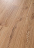 COREtec CR504 Retro Revival Autumn Oak waterproof luxury vinyl plank close-up warm mid-tone oak grain