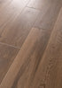 COREtec CR504 Retro Revival Cinnamon Bark Oak waterproof luxury vinyl plank close-up medium brown oak grain