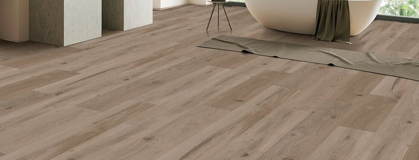 COREtec CR504 Retro Revival Smoky Linen Oak installed in a modern open-concept living room - September sale banner