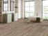 COREtec CR504 Retro Revival Smoky Linen Oak installed in modern open-concept living room