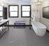 COREtec CRT01 Natural Opula Graphite Travertine vinyl tile installed in a room