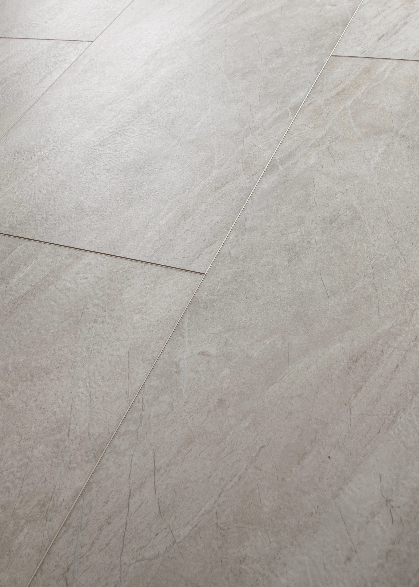 COREtec CRT01 Natural Opula Bronzeite Marble 18" x 36" vinyl tile, angled view