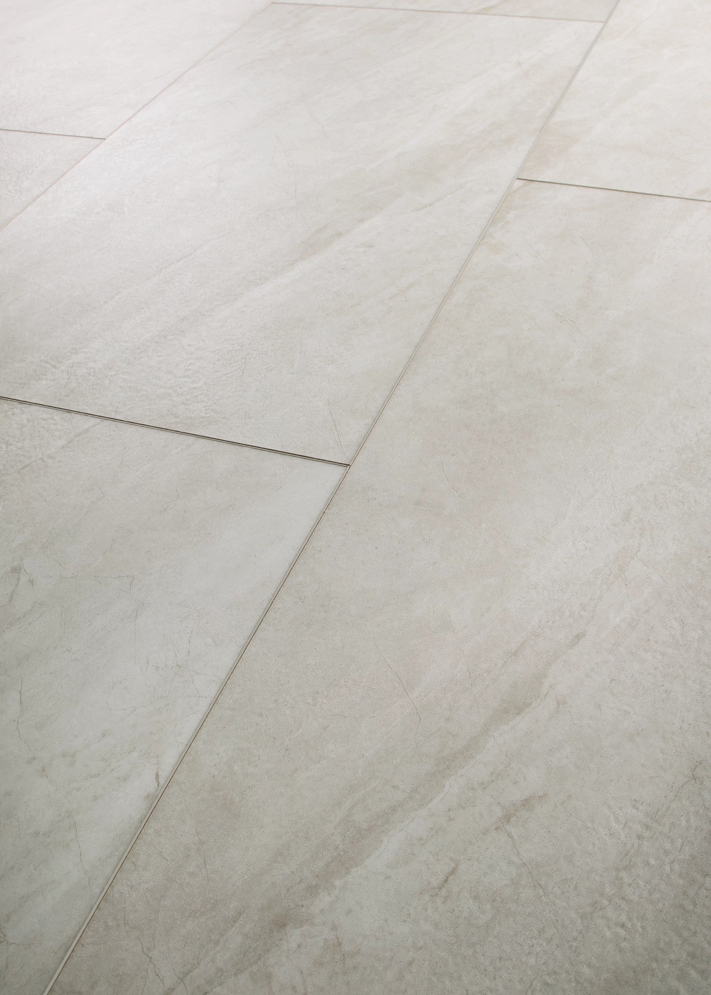 COREtec CRT01 Natural Opula Opal Travertine 18" x 36" vinyl tile, angled view