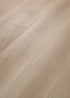 Shaw Aspire Natural Bevel 3381V Coastal Drift waterproof luxury vinyl plank close-up soft driftwood tone wood grain with natural bevel