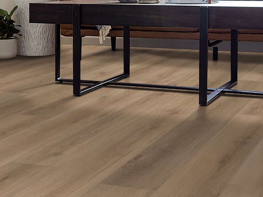 Shaw Aspire Natural Bevel Coastal Drift installed in bright airy coastal living room