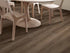 Shaw Aspire Natural Bevel Frontier Brown installed in rustic mountain style living room