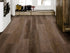 Shaw Aspire Natural Bevel Trailblazer Brown installed in bold traditional living room with rich warm tones